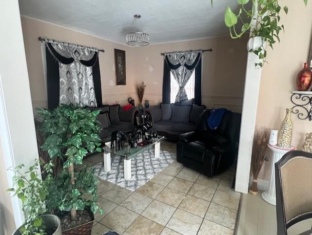 living room with light tile patterned flooring