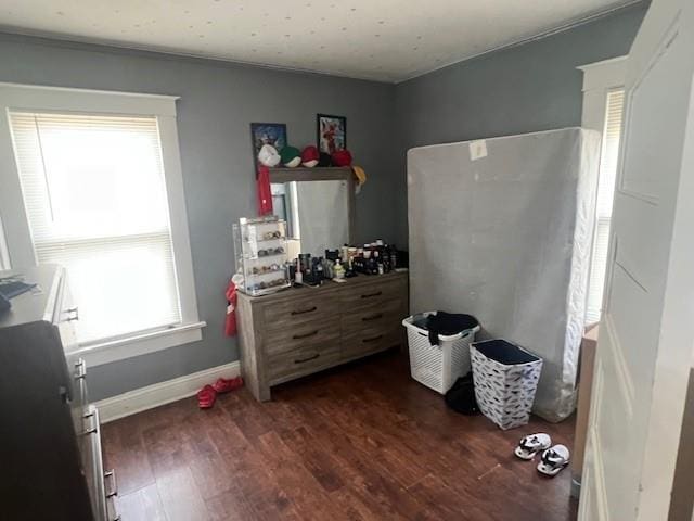 bedroom featuring dark hardwood / wood-style floors