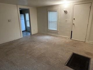 entryway with carpet floors