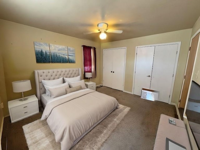 3311 Flora Ave, Kansas City, MO 64109 - bedroom featuring a ceiling fan and two closets