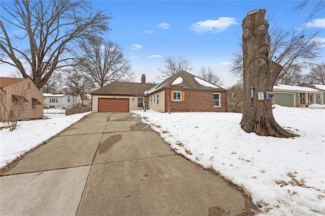 single story home featuring a garage