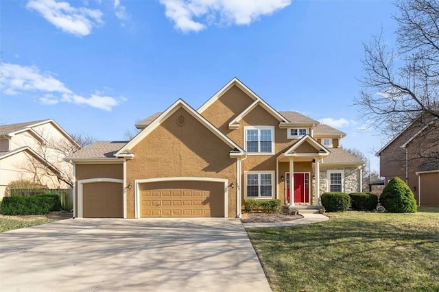 view of front of house featuring concrete driveway, an attached garage, a front lawn, and stucco siding