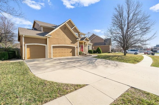 view of front of house featuring stucco siding, a front lawn, concrete driveway, and a garage