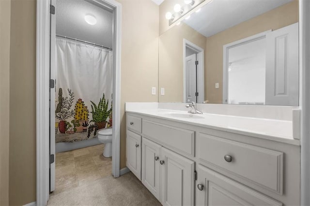 full bath featuring curtained shower, toilet, and vanity