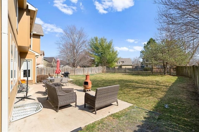 view of yard with a fenced backyard and a patio area