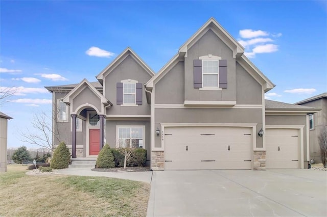 front facade with a garage and a front yard