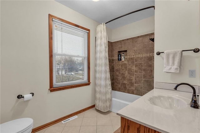 full bathroom featuring shower / tub combo, vanity, toilet, and tile patterned flooring