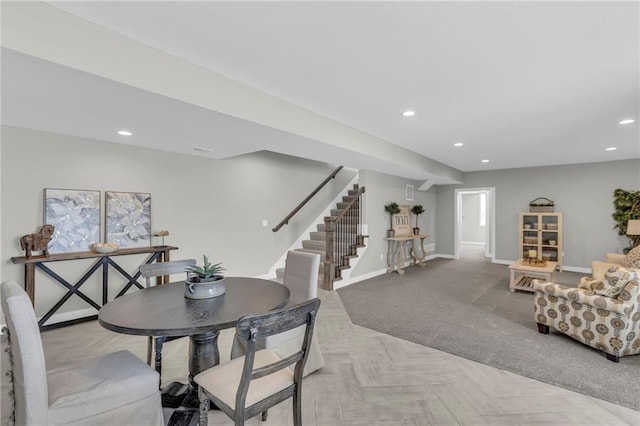 dining space featuring light parquet flooring