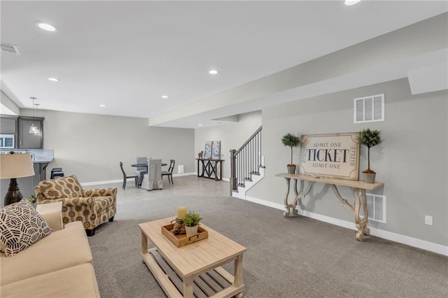 living room featuring carpet