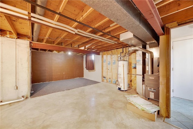 unfinished basement with heating unit and water heater