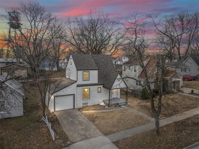 view of front of property with a garage