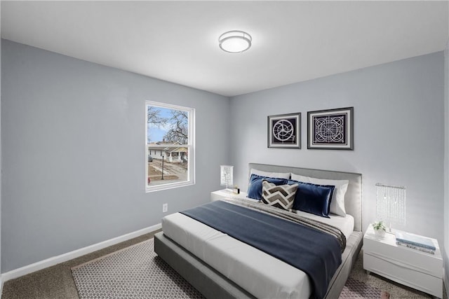 1111 Main St, Osawatomie, KS 66064 - carpeted bedroom featuring baseboards