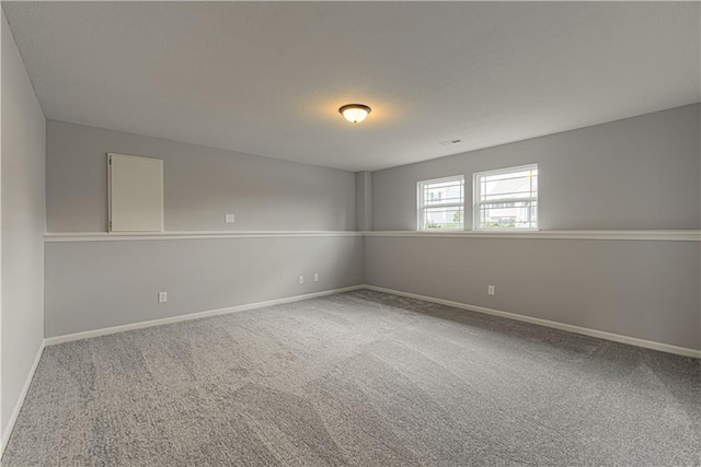 1103 Noah Ln, Kearney, MO 64060 - empty room with carpet floors and baseboards