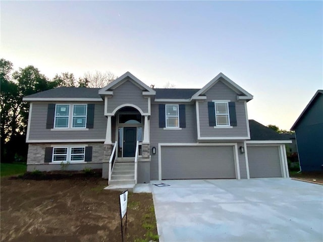 1103 Noah Ln, Kearney, MO 64060 - bi-level home with driveway and a garage