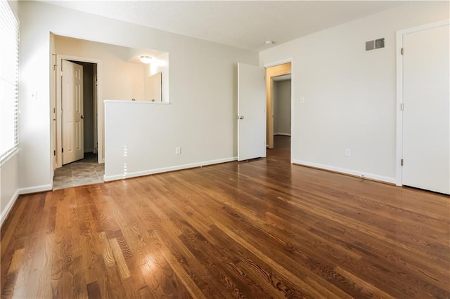 empty room featuring hardwood / wood-style floors