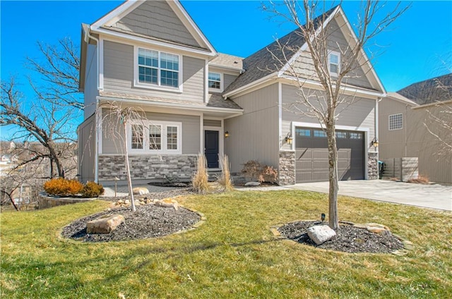 view of front of house with stone siding, a front lawn, and driveway