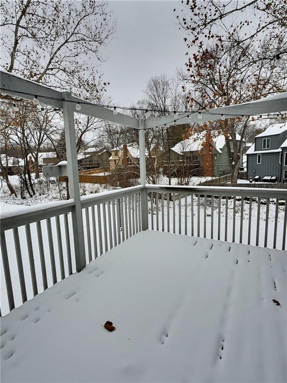 view of snow covered deck