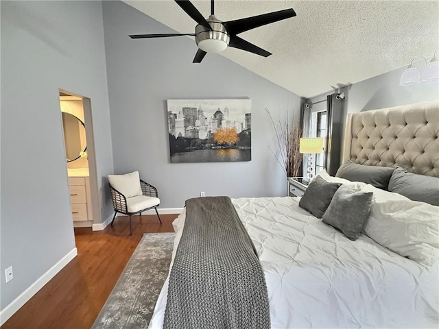 bedroom with dark wood-type flooring, ceiling fan, vaulted ceiling, and a textured ceiling