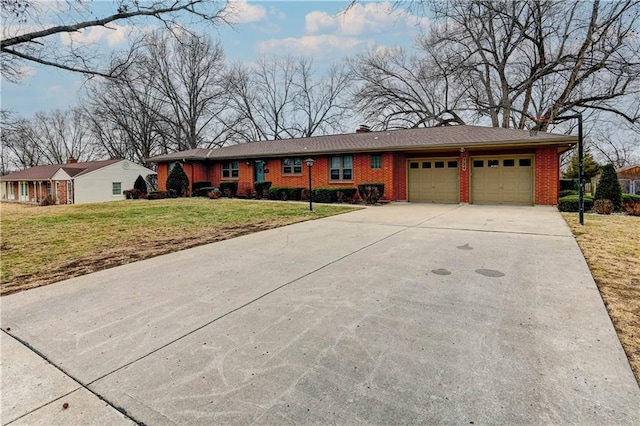 single story home with a garage and a front yard