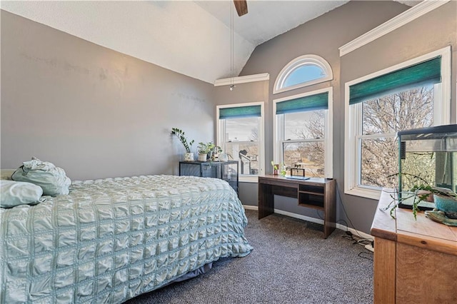 bedroom with dark colored carpet, baseboards, a ceiling fan, and vaulted ceiling