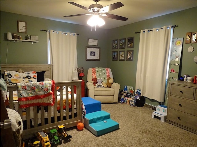 bedroom featuring ceiling fan and carpet flooring