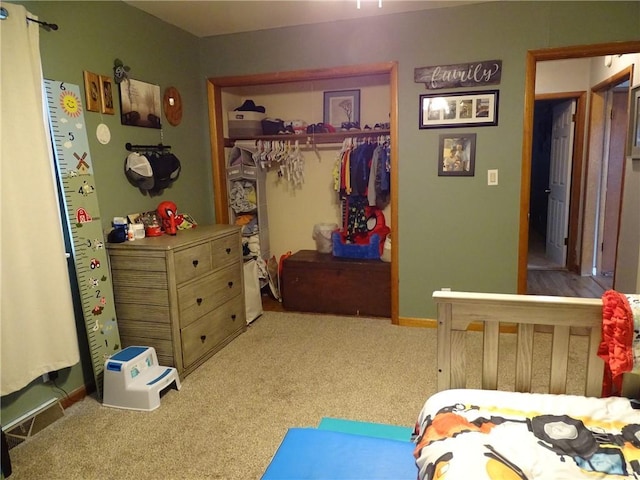 carpeted bedroom with a closet