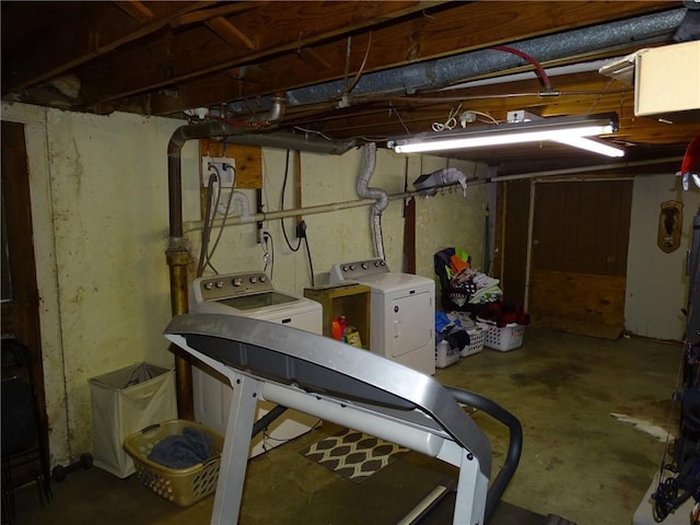 basement featuring washer and clothes dryer