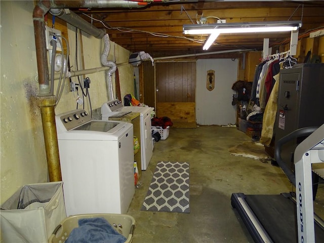 basement with separate washer and dryer