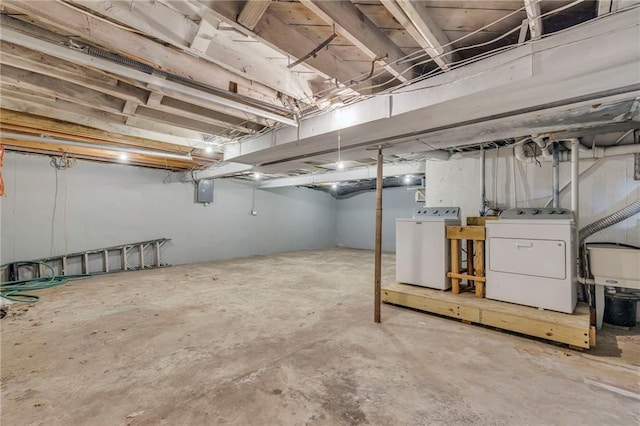 basement featuring washer and dryer