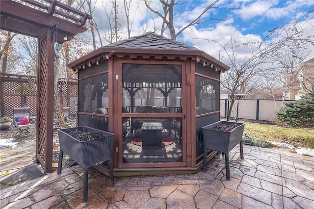 view of patio / terrace with fence