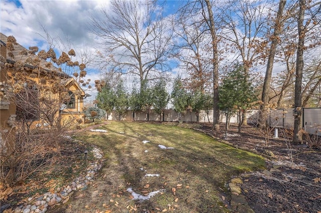 view of yard with fence