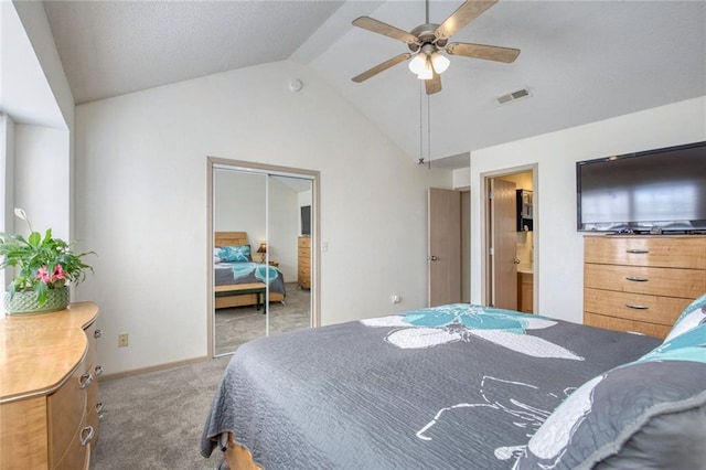 carpeted bedroom with lofted ceiling and ceiling fan