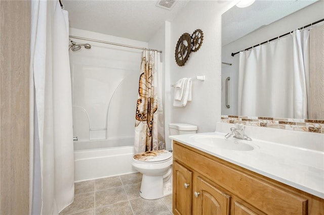 full bathroom featuring tile patterned floors, shower / bath combo, vanity, and toilet