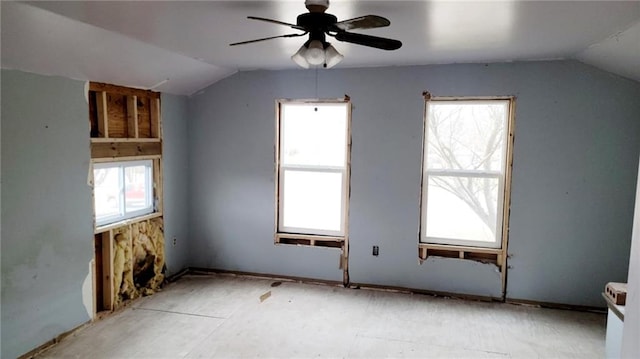619 Main St, Mound City, KS 66056 - spare room with ceiling fan and lofted ceiling
