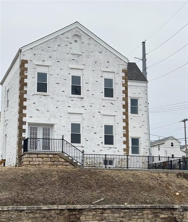 multi unit property featuring brick siding