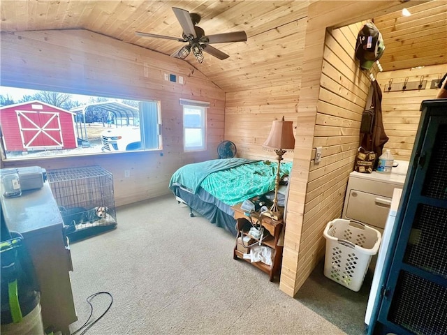 carpeted bedroom featuring ceiling fan, lofted ceiling, wooden walls, and wooden ceiling