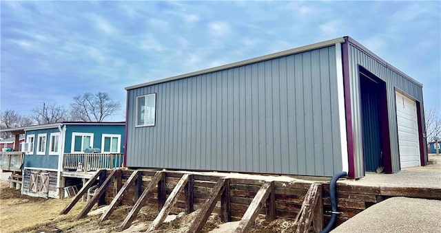 view of property exterior with a garage