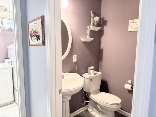 bathroom featuring toilet