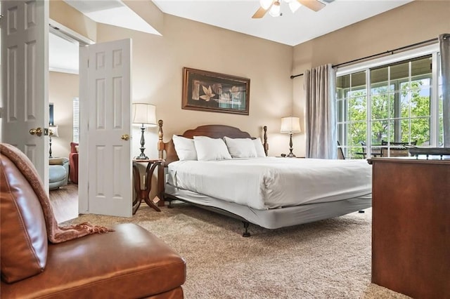 bedroom with ceiling fan and carpet