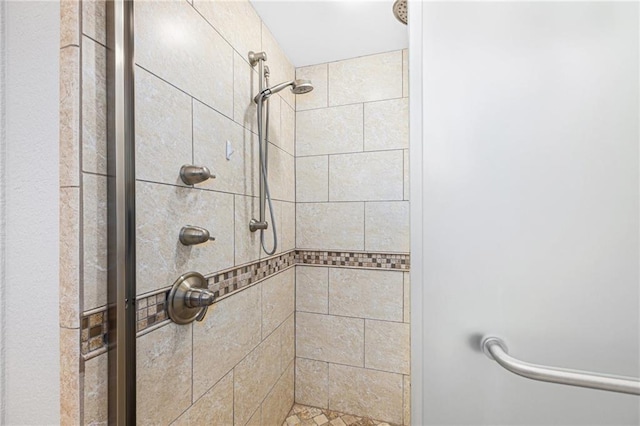 bathroom featuring a stall shower