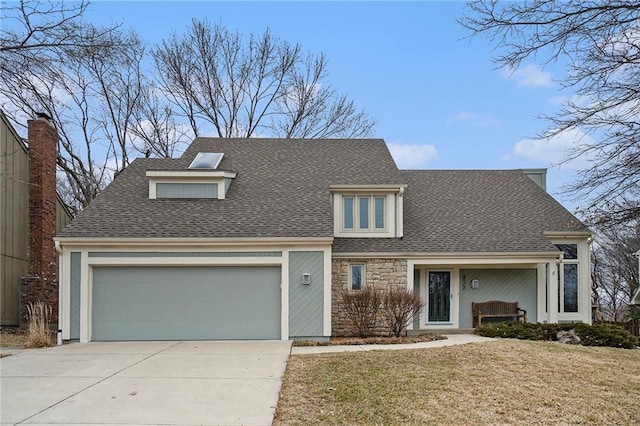 view of front of home featuring a garage, stone siding, a shingled roof, and a front lawn