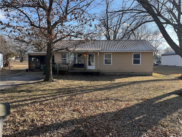 view of front of property with a wooden deck