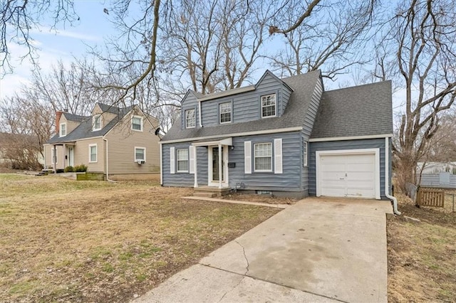 cape cod-style house featuring a garage and a front lawn