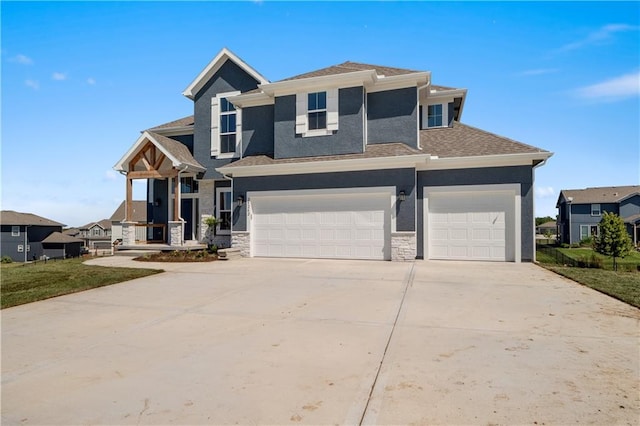 view of front of home featuring a garage