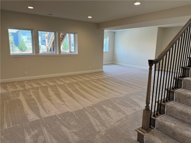 25297 W 149th Ter, Olathe, KS 66061 - spare room with light colored carpet, baseboards, stairs, and recessed lighting