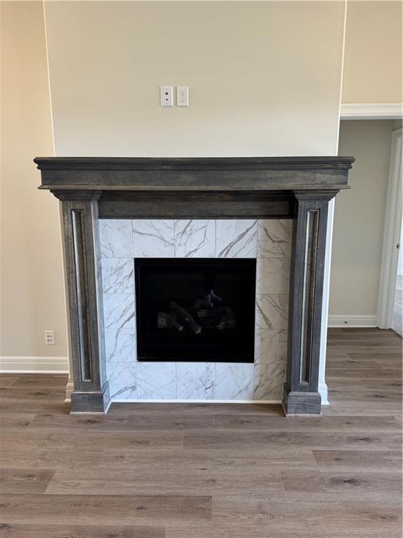 25297 W 149th Ter, Olathe, KS 66061 - detailed view of wood finished floors and baseboards