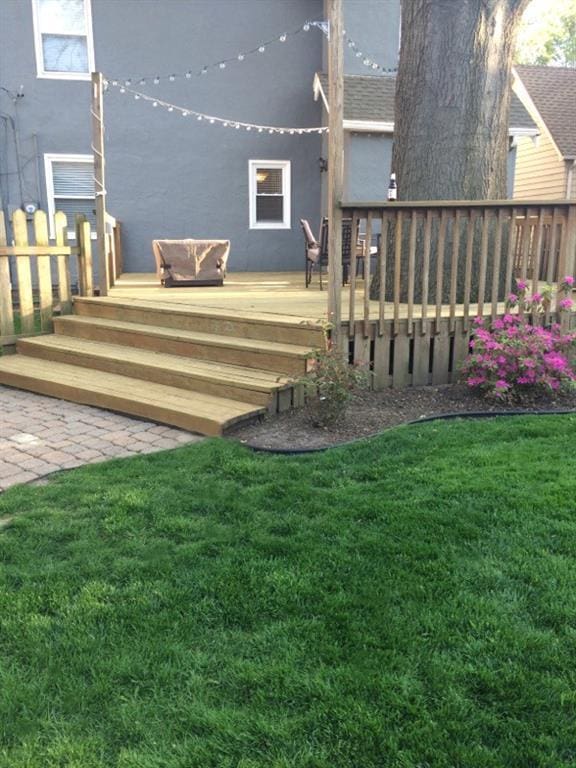 view of yard with a wooden deck