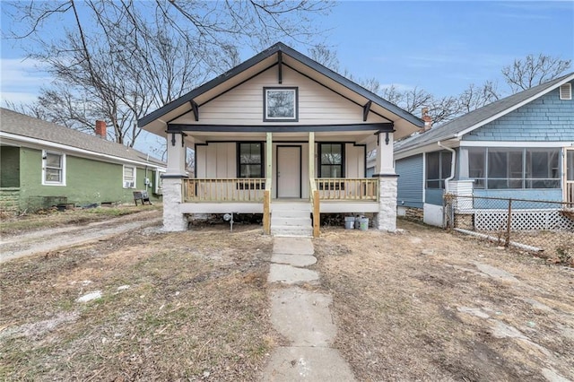 bungalow featuring a sunroom and covered porch