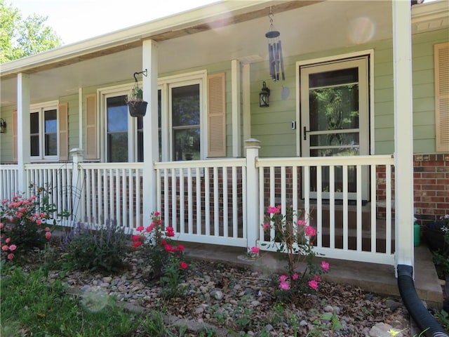 3242 K-237 Hwy, Perry, KS 66073 - entrance to property with covered porch and brick siding