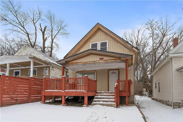 view of front of house with board and batten siding and covered porch